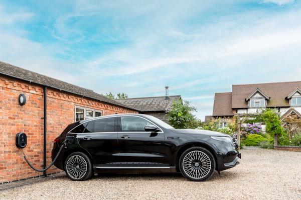 Electric vehicle charging at residential station